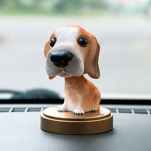 perrito de juguete que mueve la cabeza