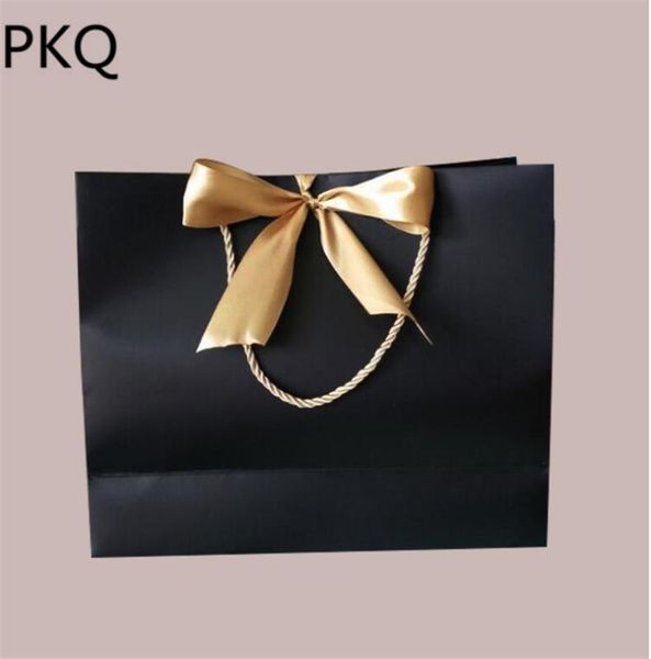 

10шт 40 * 28 * 12см большой pacakging одежда бумага подарочная сумка с ручкой high grade хозяйственная сумка женщин в подарочные пакеты отпр