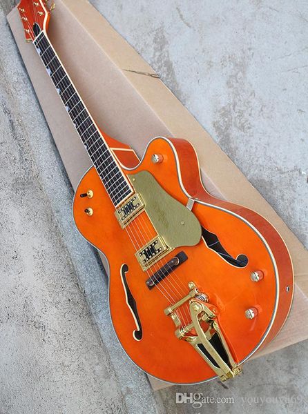 

orange semi-hollow electric guitar with gold pickup, rosewood scale, vibrato system, customized service