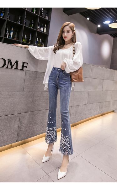 

blue flared trousers since the waist wide-legged pants