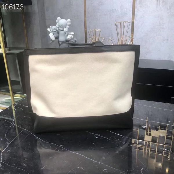 

new lady's shopping bag 7a high-end custom quality handbag fashion style style with tubular leather handle bronzed metal accessories