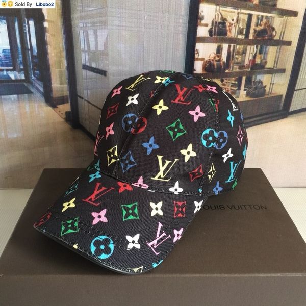 golf beret with ball on top