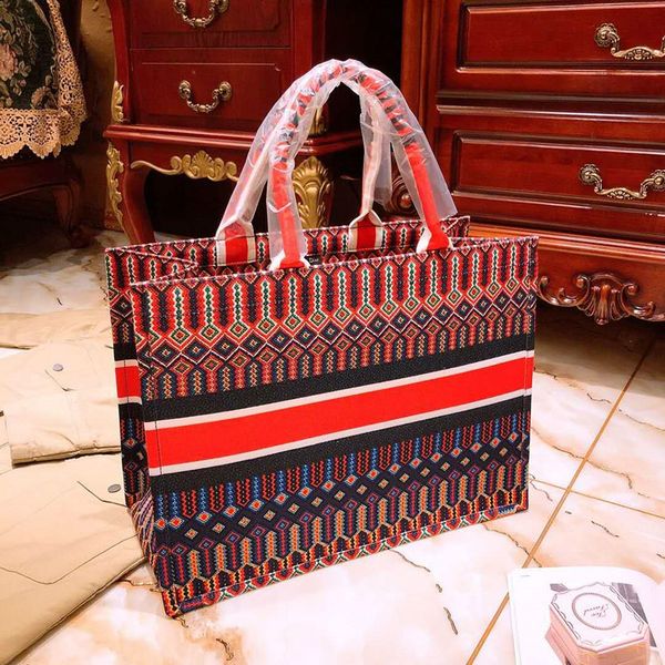 

the new canvas embroidered letters portable shopping brand designer handbag with the new tide fashion star bag wholesale luxury women purses