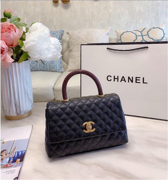 

wholesale ladies hand - held lids, fine workmanship.a high class lizard-lined cowhide for women with diagonal back and one-shoulder leather