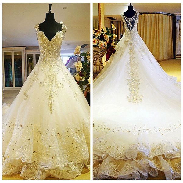 

2020 luxurious lace appliques a-line wedding dresses crystal beaded appliques slim bridal gowns illusion long bling bling vestidos, White
