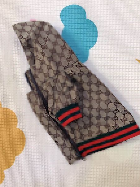 

An embroidery pet jacket trend fa hion law fighting clothe in explo ion dog clothe pet dog clothe weater collar