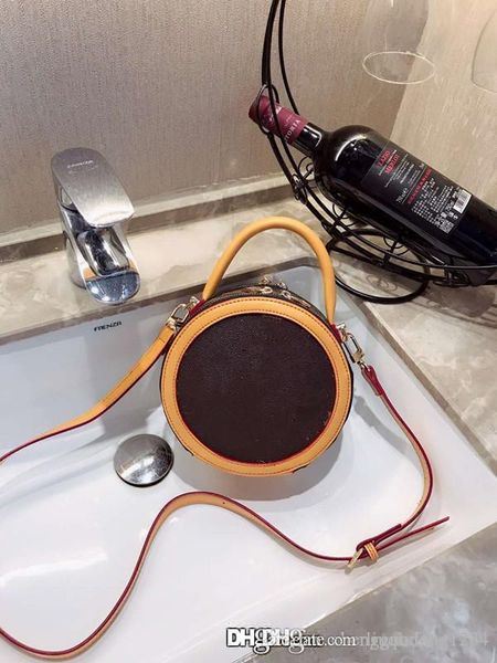 

the new small round inclined shoulder bag genuine leather messenger for women handbag brim designer purses shoppers tote