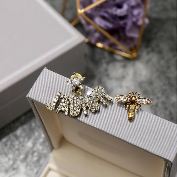 

Быть_наст штампы моды бренд письма пчелиных дизайнерские серег для дизайна леди Женщины партий Свадебного Lovers подарка ювелирных изделий для невесты с коробкой