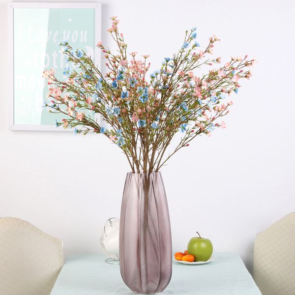 

artificial flowers artificial plums wedding plants home shop window decoration pgraph background setting display floral