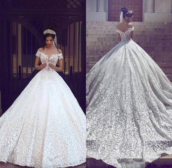 

Saudi Arabic Dubai 2019 Luxury Short Sleeves Wedding Dresses Off Shoulder Appliques Backless with Sweep Train Bridal Gowns Robe de marriage