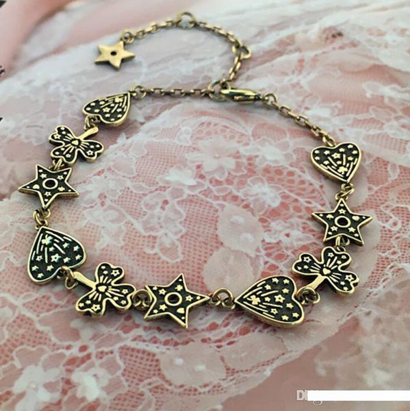 

дизайнер ювелирных изделий шарма сердца браслеты пятиконечные звезды бабочки шарма браслеты цвета старого металла для женщин горячей моды, White