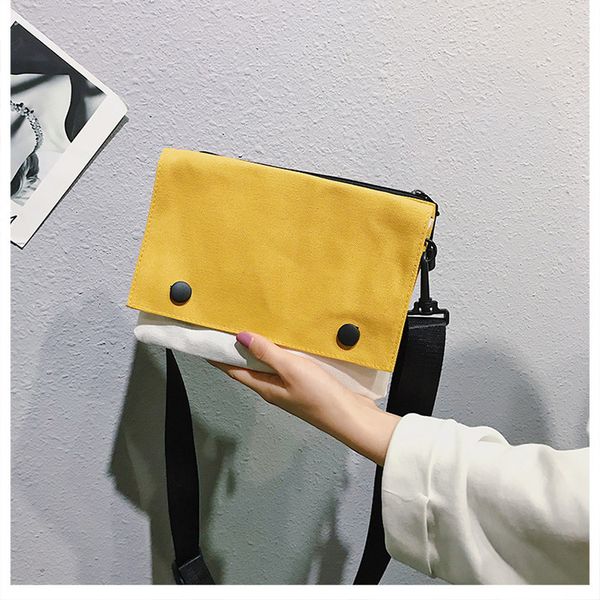 

2019 new korean version of harajuku simple messenger bag female wild ins student canvas bag hit color single shoulder small square bag