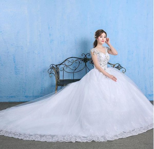 2019 Immagini reali Cina Ultime vendite calde Appliques Modern Saxy Abito da sposa in pizzo senza schienale da donna Abito da sposa in pietra di cristallo arabo rustico