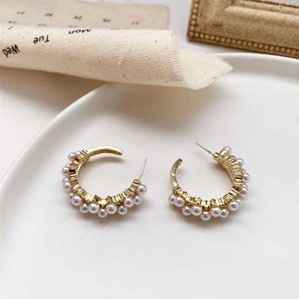 

2020 new arrival s925 silver needle korean wild spaced jewel earrings female retro hollow semi-circular pearl earrings