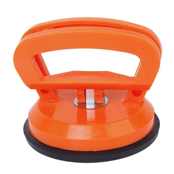 

red sucker suction pad treats the dent puller remover glass heber