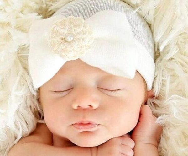 Neugeborenen Hut Bogen Blume Baby Strickmützen Mutterschaft 2020 Frühling Herbst Winter Baumwolle warme Mütze gestreift europäischen Großhandel 0-6 Monate