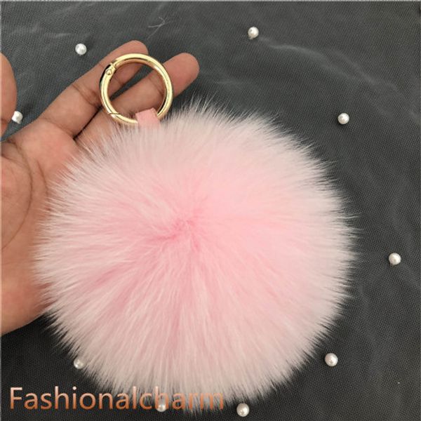 Nappe con ciondolo portachiavi con pompon in vera pelliccia di volpe rosa da 13 cm