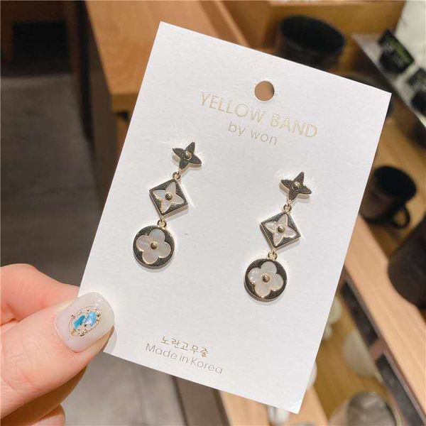 

2020 new lady 18k gold fritillary long earrings 925 silver premium luxury fashion design four leaf temperament jewelry wholesale