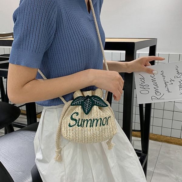 

2019 fashion women's woven drawstring bag drawstring string straw weave messenger bag english embroidered word shoulder