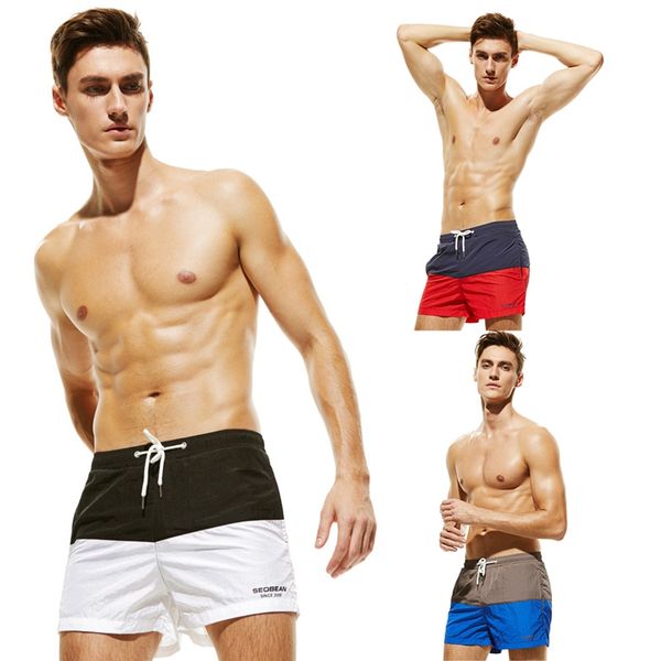 

summer men's beach sports quick-drying dehydration three-pants striped color matching sports shorts, White;black