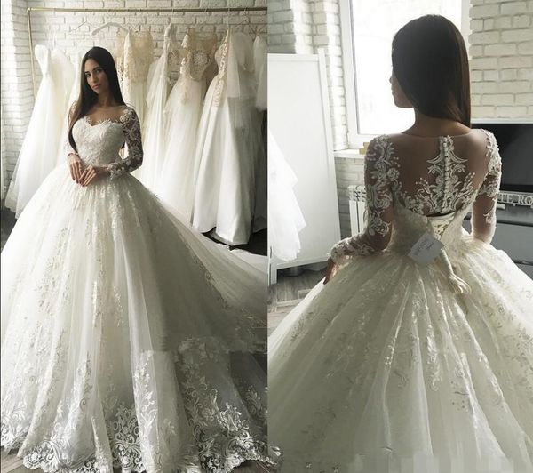 Abiti da sposa a maniche lunghe con scollo rotondo modesto 2019 corsetto Plus Size Abito da ballo in pizzo Abiti da sposa su misura Dubai Arabia Saudita