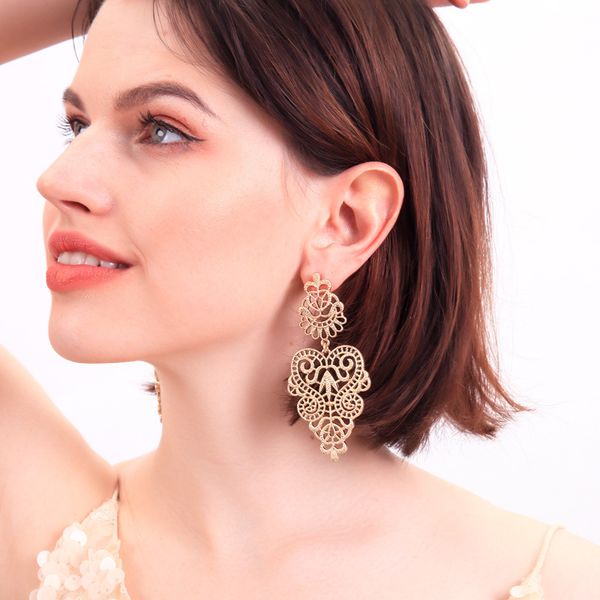 

ретро сплав полым из цветка серьги стержня женщин personality отдыха серьги new-европейской и американской моды аксессуары, Golden