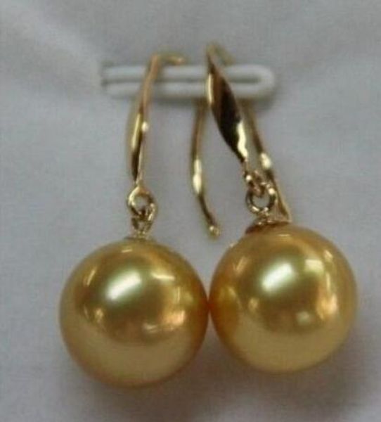 

envÃ­o gratis hermosa de 10-11mm redonda natural del mar del sur pendientes de oro y perlas 14 k, Silver