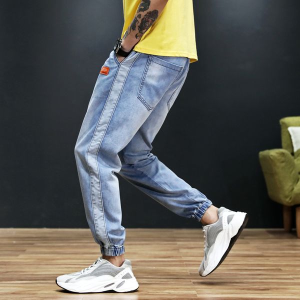 

japanese style fashion men jeans blue color stripe spliced loose fit harem pants hombre streetwear hip hop joggers jeans men
