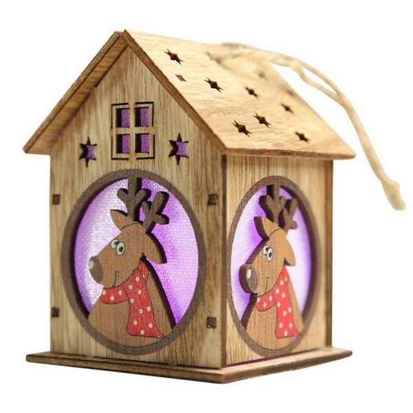 

creative new year christmas wooden christmas lighted cabin assembling small house christmas tree ornaments glowing colored cottage