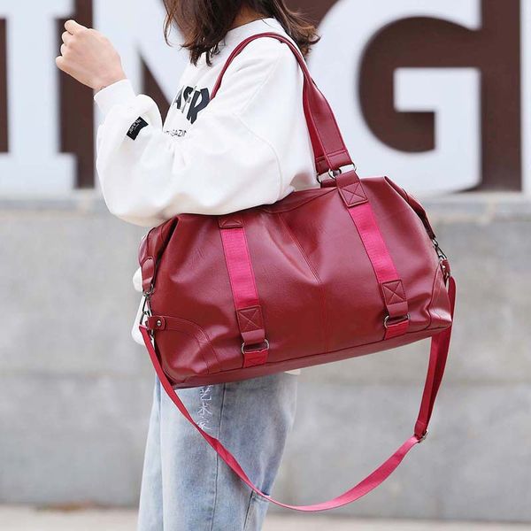 

new travel bag pu material soft leather men and women waterproof fitness bag sports training