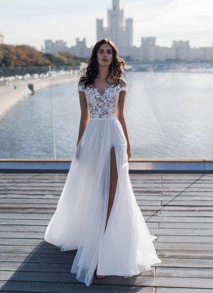 

скромная boho бич свадебные платья sheer шеи короткими рукавами кружева bohemian свадебное платье с разрезами 2020 полная длина тюль дешевые, White