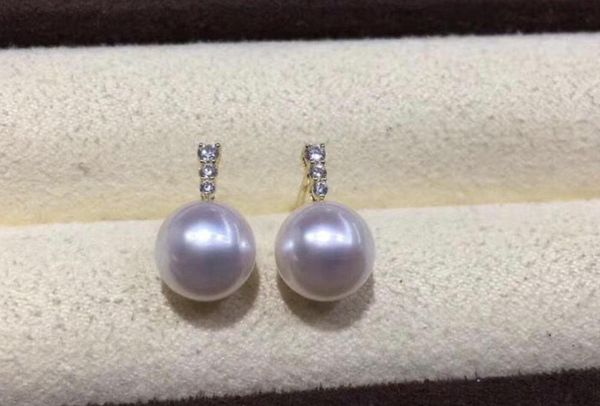 

elegant 10-11mm south sea round white pearl earring 14k, Golden;silver