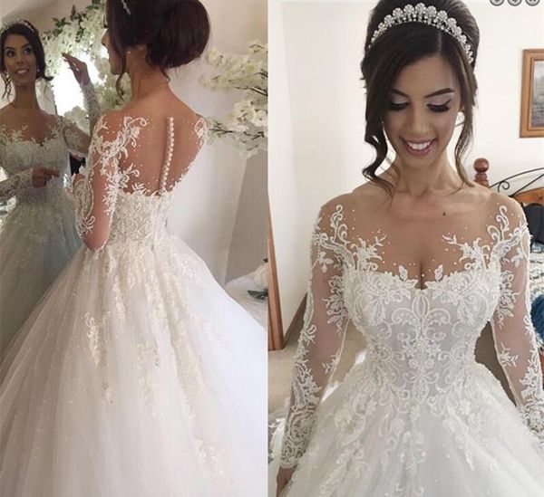 Illusione africana gioiello maniche lunghe abiti da sposa con applicazioni di perline cappella treno gonna a sbuffo chiesa araba abiti da sposa taglie forti Z50