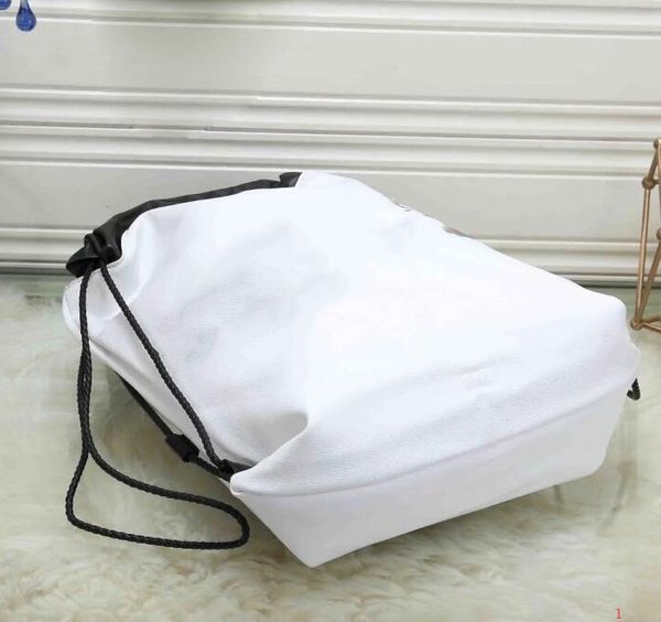 

designer-casual traveling backpack fashion c0py leather women backpack man bag luxury large capacity travel bag rg2022618