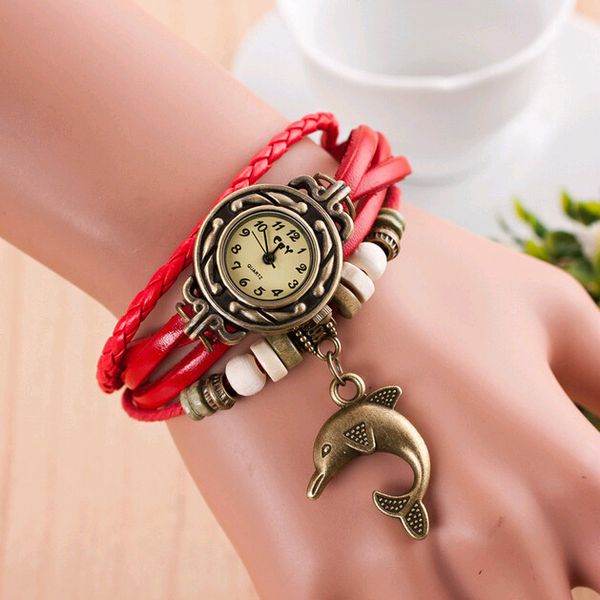 Orologi con cinturino in pelle da ragazza retrò Orologio da vestito alla moda Orologio da polso con ciondolo a delfino Bracciale al quarzo Orologio da donna con tessuto a corda