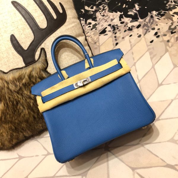 

wholesale,half handmade togo leather blue design purse30cm,also have size 25 35cm,wax thread,have gold and silver hardware,fast delivery