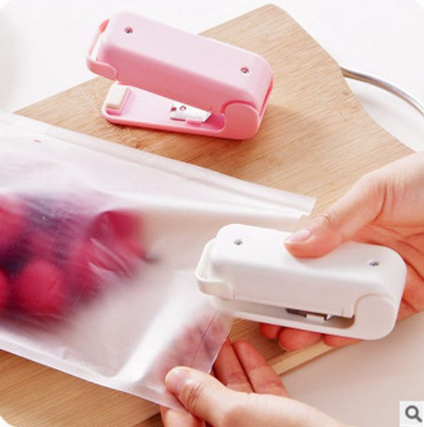 

portable mini- food snacks plastic bag up household hand pressure heat seal machine 50g