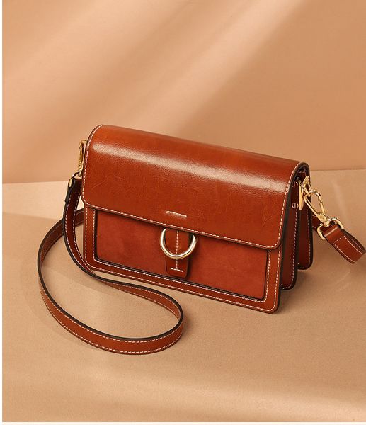 

2019 new baiqi zhenpi organ small package fashion summer women's bag network red explosion xiaockniupi oblique cross bag