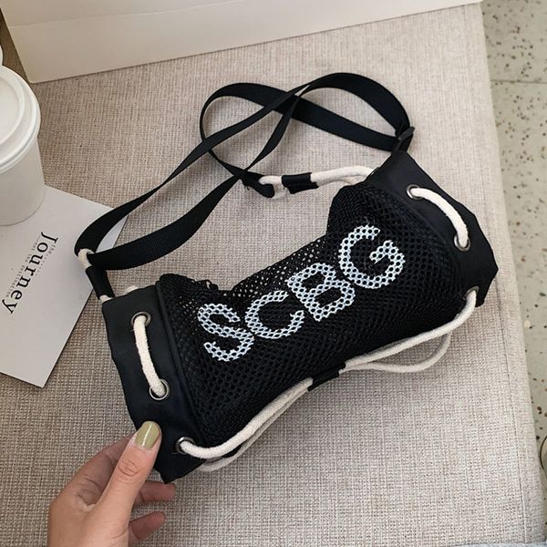 

ladies summer new seaside travel hollow out mesh beach bag fashion letter cylinder bag casual light crossbody bags 2020