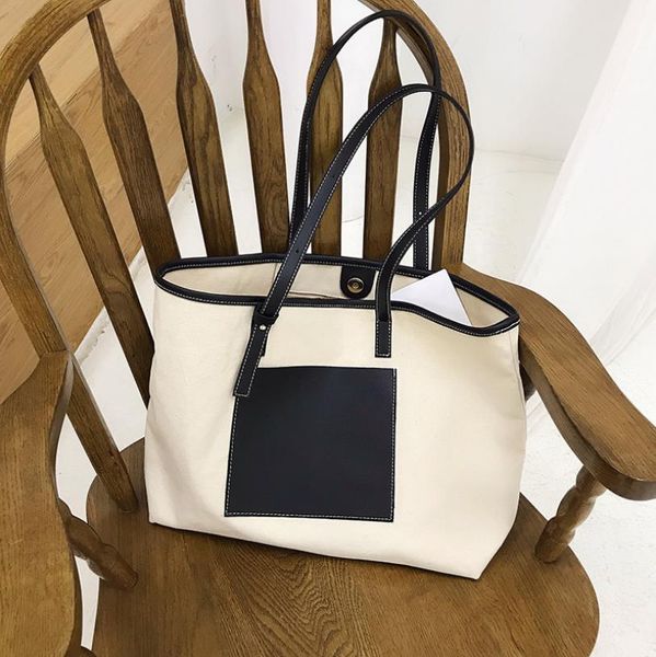 

design new type of minimalist pu splicing canvas one shoulder big bag for women's handbag portable and versatile commuter tote