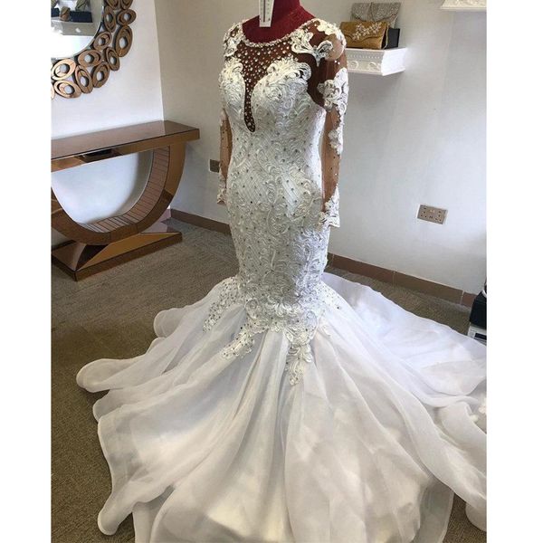 

2020 luxury mermaid wedding dresses jewel neck illusion lace appliques crystal beaded long sleeves court train african bridal gowns, White