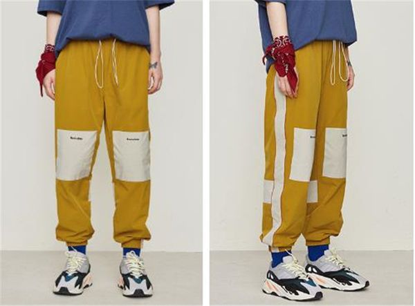 

Mens Designer Letter Printed Sports Pants Mens Loose Panelled Running Pants Fashion Sport Pants With Drawstring