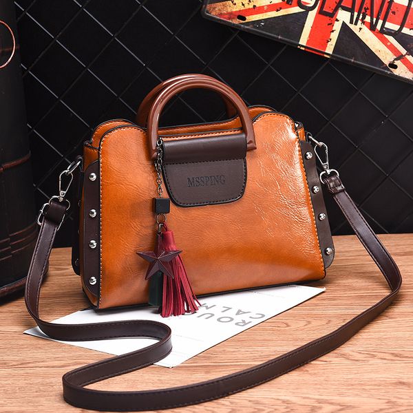 

lanzhixin 2020 new fashion women pu leather handbags vintage rivet tassel messenger bag for female ladies shoulder bag