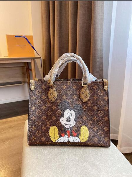 

2020 new classic wild women's classic wild leather cartoon ladies fashion crossbody bag handbag wild backpack shoulder bag