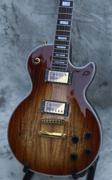 

electric guitar with rooted maple natural, cst spalted maple top