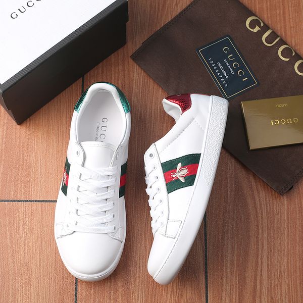 

78gucci pring and autumn new ca ual hoe neaker men and women wild white hoe
