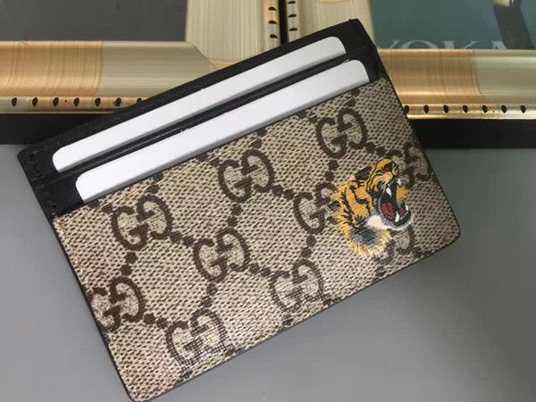 

Sell de igner hort wallet leather card holder cla ic fa hion wallet 13 gucci 13 00 male patchwork pur e nake bee mall wallet