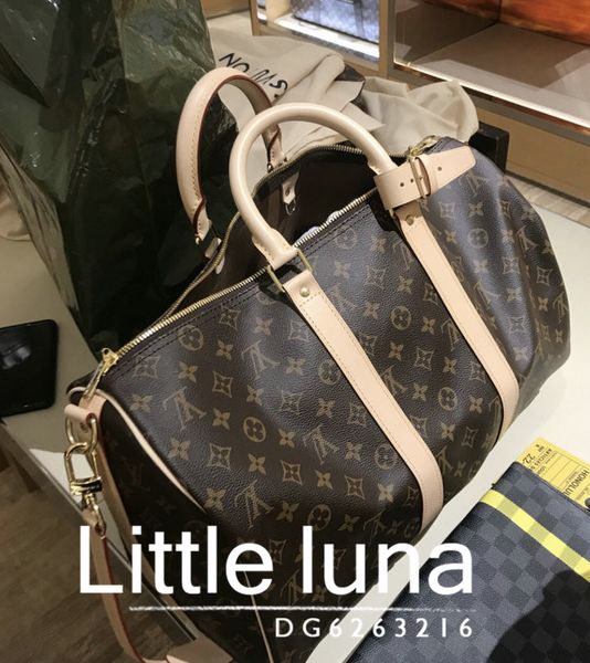 

2019 new pattern women men luxury bag duffel bag ca ual brand de igner houlder travel bag carry on luggage keepall 45 bag c