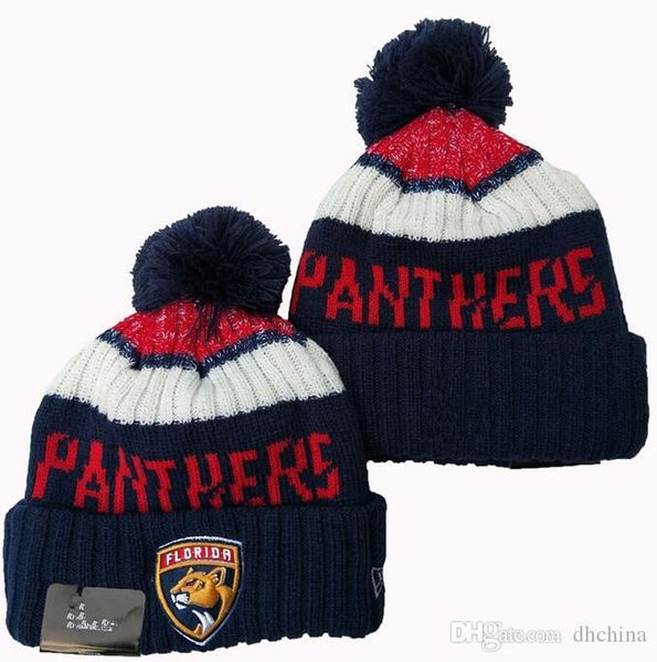 sports beanie hats with pom