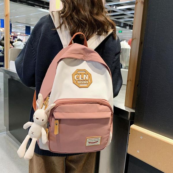

2020 new waterproof nylon women backpack fashion female school bags travel backpacks large capacity letter book bag mochilas
